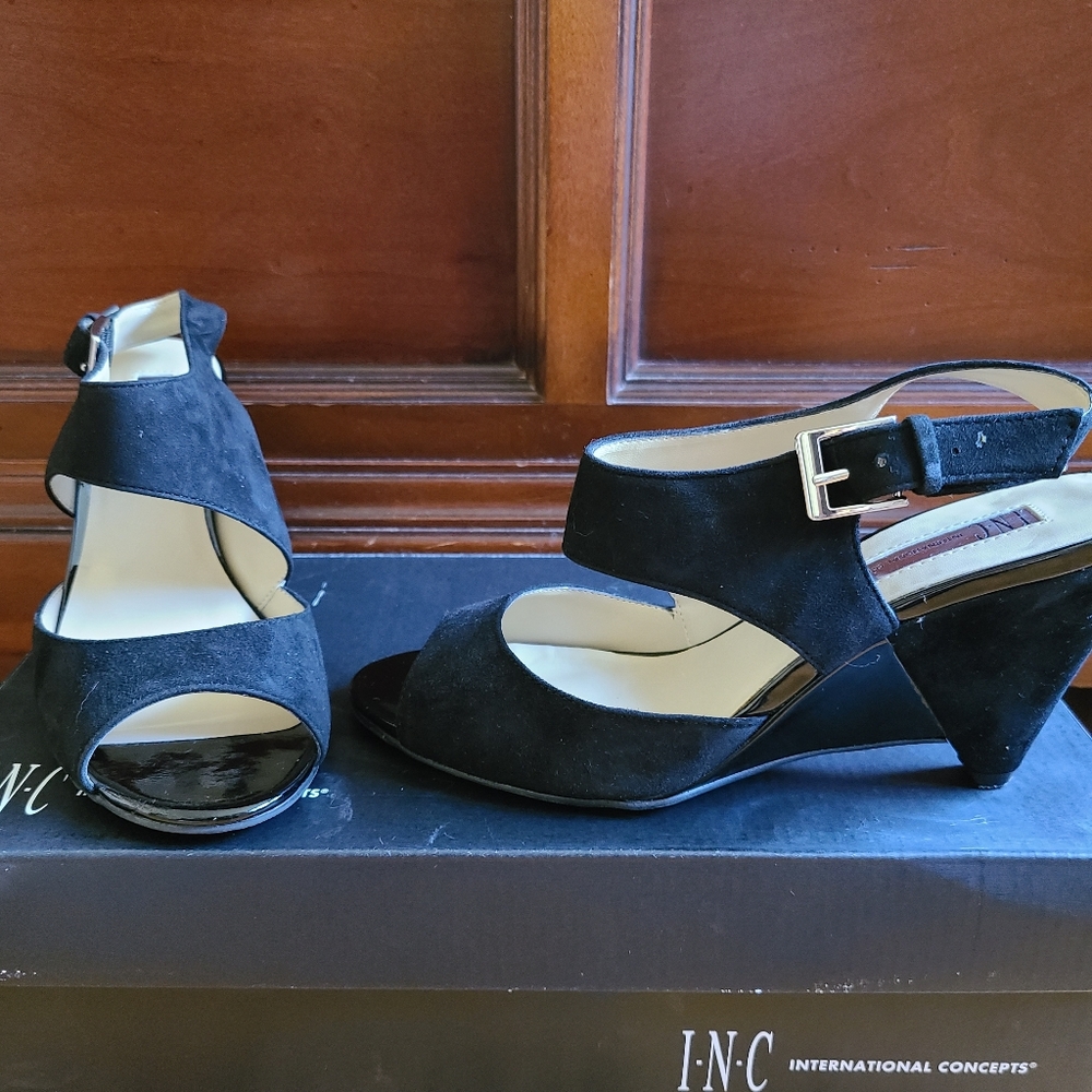 Black suede and patten leather heels.
